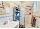 Clean bathroom with shower, vanity, and storage at 4543 20Th N Ave, St Petersburg, FL 33713