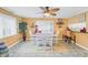 Dining area with white table and chairs, decorative rug, and ceiling fan at 4543 20Th N Ave, St Petersburg, FL 33713