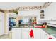 View of the kitchen with a glimpse into the adjacent living area at 4543 20Th N Ave, St Petersburg, FL 33713