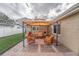 Backyard patio with a gazebo, wicker furniture, and a view of the lawn at 4543 20Th N Ave, St Petersburg, FL 33713