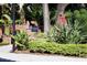 Outdoor kitchen and grilling area with lush landscaping at 504 S Armenia Ave # 1323, Tampa, FL 33609