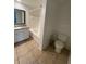 Clean bathroom with bathtub, toilet and vanity at 504 S Armenia Ave # 1323, Tampa, FL 33609