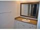 Bathroom boasts a vanity with a large mirror and a bathtub at 504 S Armenia Ave # 1323, Tampa, FL 33609