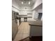 Modern kitchen with stainless steel appliances and white cabinets at 504 S Armenia Ave # 1323, Tampa, FL 33609