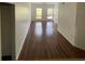 Living room with hardwood floors and plenty of natural light at 504 S Armenia Ave # 1323, Tampa, FL 33609