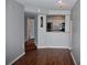 Bright living room with hardwood floors and an open concept at 504 S Armenia Ave # 1323, Tampa, FL 33609