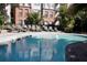 Relaxing community pool with plenty of lounge chairs at 504 S Armenia Ave # 1323, Tampa, FL 33609