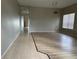 Dining room with wood-look flooring, tile inlay, and chandelier at 5239 Braddock Dr, Zephyrhills, FL 33541