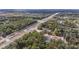 Vast aerial view of a landscape featuring a highway amidst greenery at 5250 Little Green Ln, Dade City, FL 33523