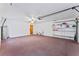 Spacious garage with ample storage and shelving at 5250 Little Green Ln, Dade City, FL 33523