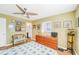 Bright bedroom with wood floors and ceiling fan at 6110 2Nd S Ave, St Petersburg, FL 33707