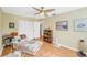 Serene bedroom with ceiling fan, closet, and natural light at 6110 2Nd S Ave, St Petersburg, FL 33707