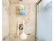 Clean shower with built-in shelving and grab bars at 6110 2Nd S Ave, St Petersburg, FL 33707