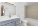 Updated bathroom with vanity, toilet, and shower at 7235 12Th N Ave, St Petersburg, FL 33710