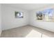 Bright bedroom with two large windows providing ample natural light at 7235 12Th N Ave, St Petersburg, FL 33710