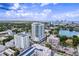 Aerial view of a high-rise building in a city with a lake at 777 3Rd N Ave # 1206, St Petersburg, FL 33701