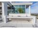 Modern outdoor kitchen features a sink and two grills, ideal for alfresco dining and entertaining on the rooftop at 777 3Rd N Ave # 1206, St Petersburg, FL 33701