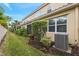 View of the home's exterior, showcasing the screened patio at 8723 Terracina Lake Dr, Tampa, FL 33625