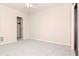 Bedroom with closet and adjoining door at 8737 Bardmoor Pl # 101, Seminole, FL 33777