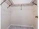 Walk-in closet featuring wire shelving for storage at 8737 Bardmoor Pl # 101, Seminole, FL 33777