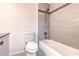Updated bathroom features tiled shower and tub combination, modern fixtures, and stylish design at 9100 Dr Martin Luther King Jr N St # 1706, St Petersburg, FL 33702