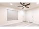 Bedroom showcasing a ceiling fan, neutral walls, window with blinds, and light wood floors at 9100 Dr Martin Luther King Jr N St # 1706, St Petersburg, FL 33702