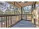 Relaxing screened patio overlooking wooded area, providing a serene outdoor space at 9100 Dr Martin Luther King Jr N St # 1706, St Petersburg, FL 33702