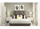 Stylish bedroom with a gray headboard, white nightstands, and patterned curtains at 11264 E 65Th Ter, Palmetto, FL 34221