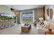Cozy living room with sliding glass doors leading to the backyard at 1148 Great Ibis Dr, Ruskin, FL 33570