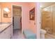 Bathroom with shower, toilet and linen closet at 14130 Rosemary Ln # 5301, Largo, FL 33774