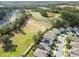 Aerial view of houses and a golf course at 17766 Garsalaso Cir, Brooksville, FL 34604