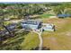 Aerial view of community clubhouse with walking paths at 17766 Garsalaso Cir, Brooksville, FL 34604