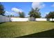 Large backyard with grassy area and privacy fence at 17766 Garsalaso Cir, Brooksville, FL 34604