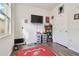 Spacious bedroom with wood floors, bookcase, and window at 17766 Garsalaso Cir, Brooksville, FL 34604