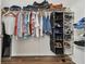 Large walk-in closet with shelving and hanging rods at 17766 Garsalaso Cir, Brooksville, FL 34604