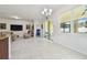 Bright dining area with view to backyard and kitchen at 17766 Garsalaso Cir, Brooksville, FL 34604