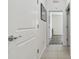 Clean and bright hallway with access to bedrooms at 17766 Garsalaso Cir, Brooksville, FL 34604