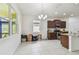 Spacious kitchen with island, stainless steel appliances, and granite countertops at 17766 Garsalaso Cir, Brooksville, FL 34604