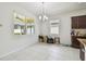 Spacious kitchen with island, stainless steel appliances, and granite countertops at 17766 Garsalaso Cir, Brooksville, FL 34604
