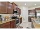 Well-equipped kitchen, offering ample cabinetry and counter space at 17766 Garsalaso Cir, Brooksville, FL 34604