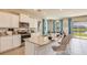 Spacious kitchen with island, stainless steel appliances, and granite countertops at 18228 Metado Dr, Lakewood Ranch, FL 34211