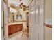 Clean bathroom with double vanity and a linen closet at 204 Mystic Falls Dr, Apollo Beach, FL 33572