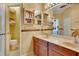 Spacious bathroom with double vanity and linen closet at 204 Mystic Falls Dr, Apollo Beach, FL 33572