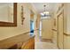 Elegant entryway with console table and mirror at 204 Mystic Falls Dr, Apollo Beach, FL 33572