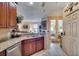 Well-equipped kitchen with granite counters and stainless steel dishwasher at 204 Mystic Falls Dr, Apollo Beach, FL 33572