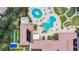 Community pool, clubhouse, and surrounding landscape at 204 Mystic Falls Dr, Apollo Beach, FL 33572