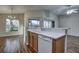 Bright dining area with hardwood floors and a chandelier at 20538 Homossasa Ct, Land O Lakes, FL 34637