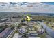 Aerial view showcasing condo building near waterway, highlighting its location and amenities at 220 Dogwood Cir # 220, Seminole, FL 33777