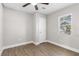 Bright bedroom with wood-look flooring and a closet at 2312 14Th W Ave, Bradenton, FL 34205