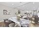 Elegant dining room with marble table and modern chairs at 2312 14Th W Ave, Bradenton, FL 34205